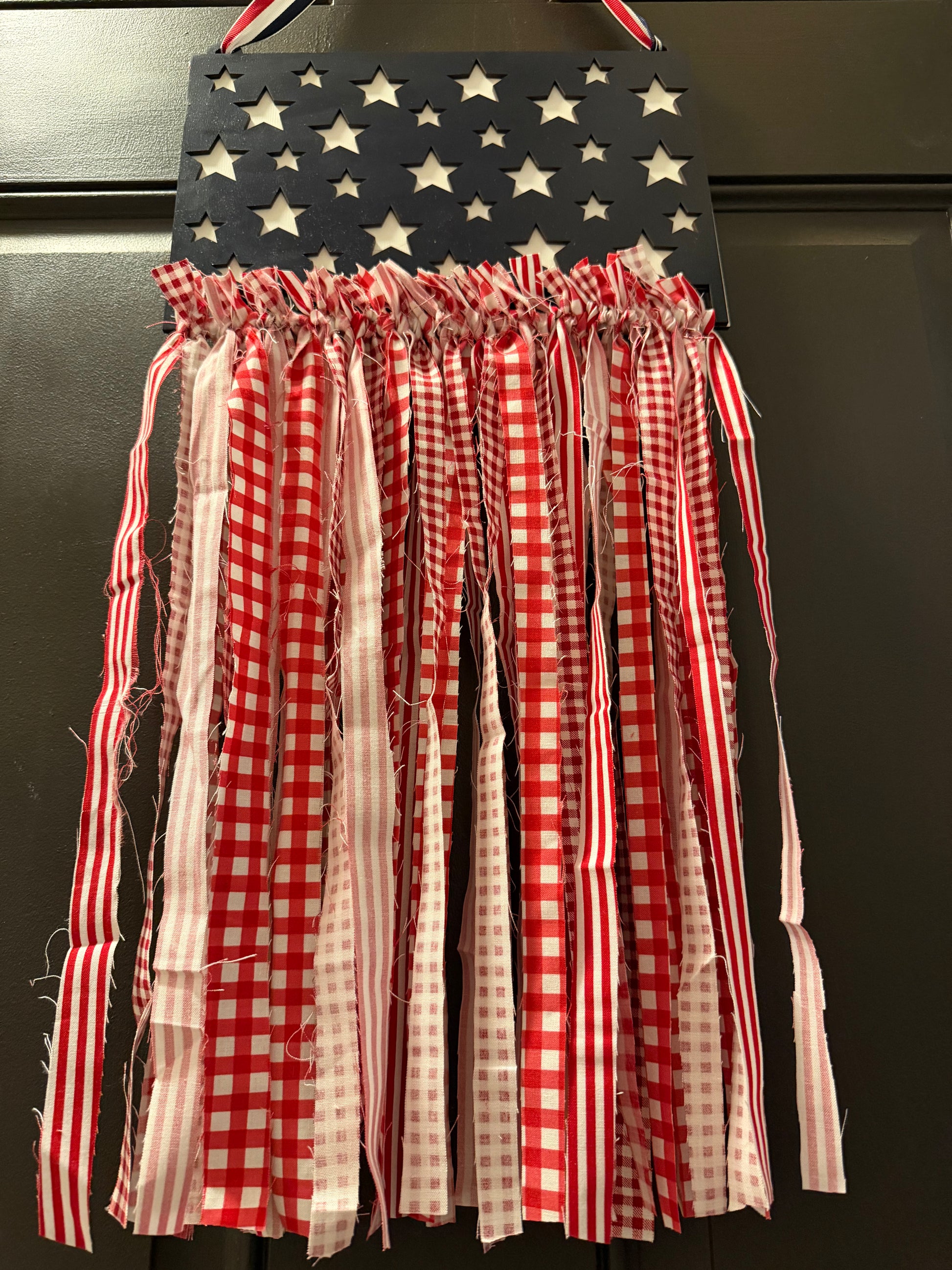 Decorative wall hanging with American flag design and checkered fabric